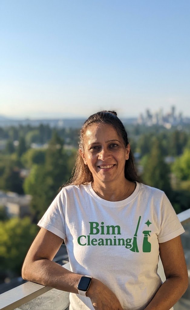Bimla, owner of Bim Cleaning, on a Vancouver balcony